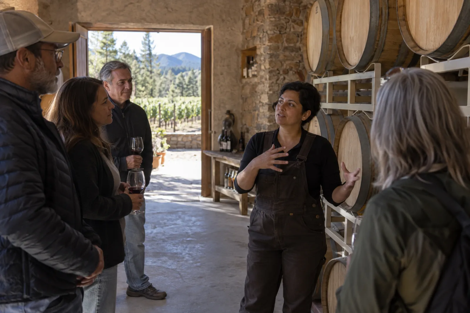 Lucia leading a small group through the cellar